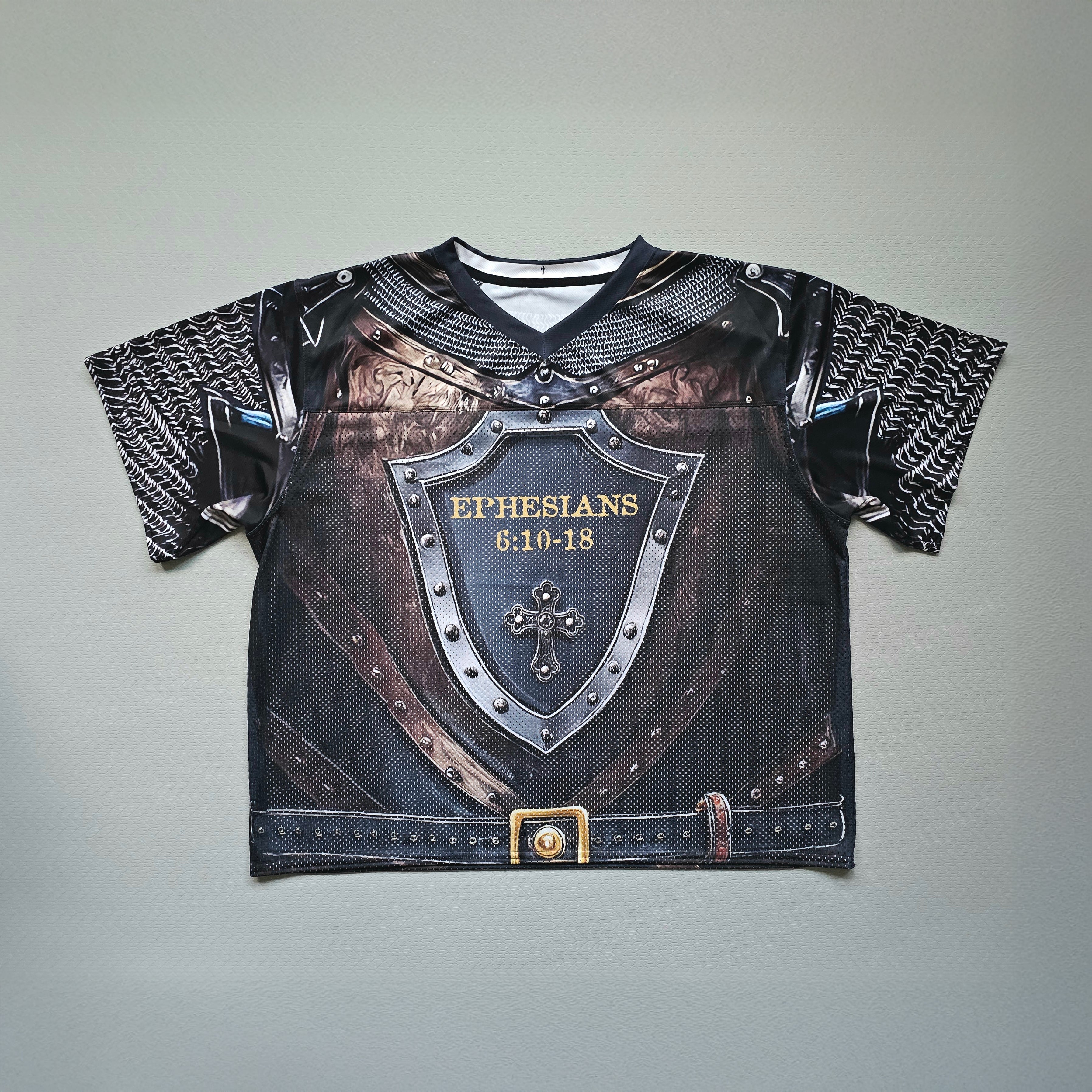 Football jersey with armor design and 'Ephesians 6:10-18' text on a gray background