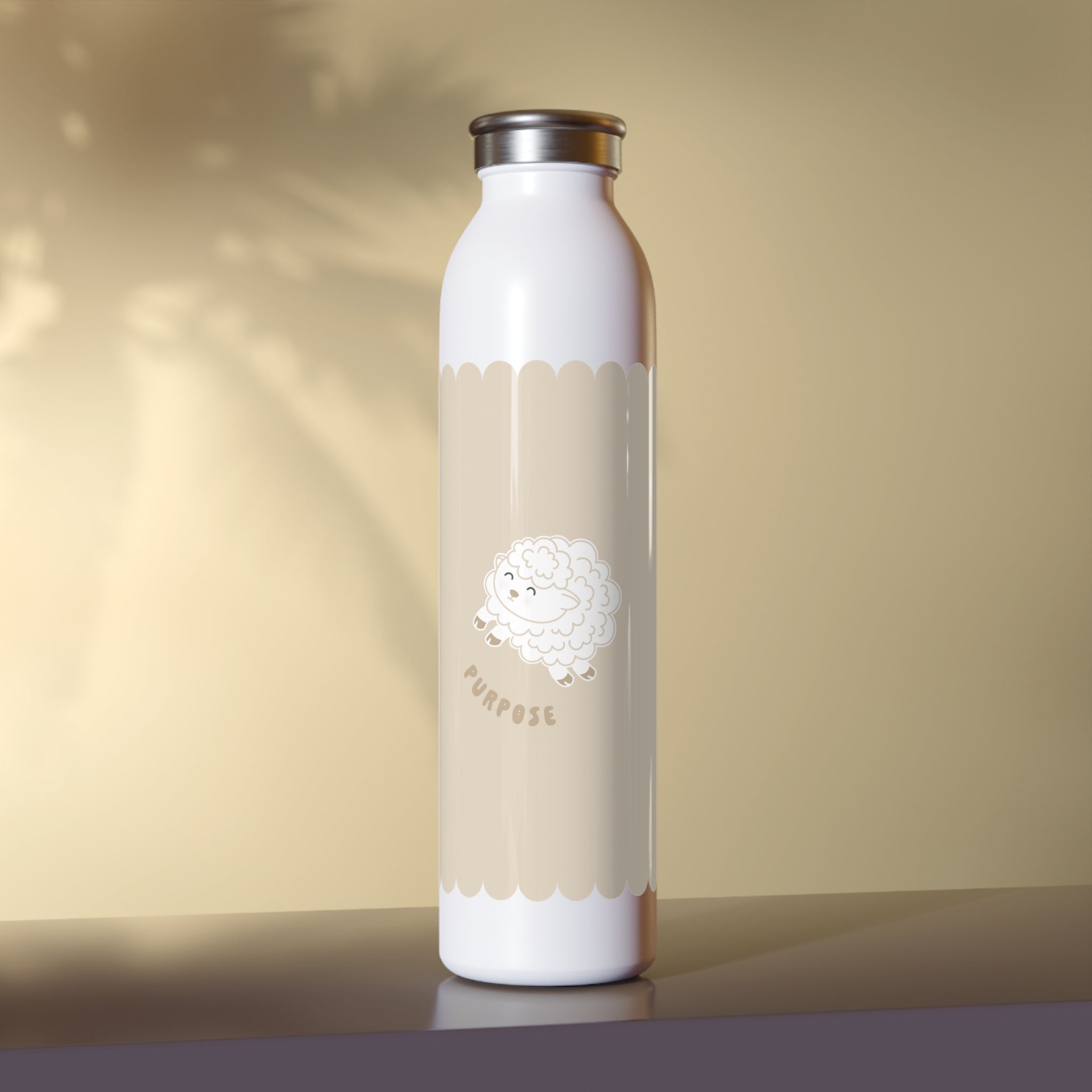 A white insulated water bottle with a beige scalloped band featuring a cute lamb illustration and the word 'PURPOSE', standing on a dark surface against a warm beige background.