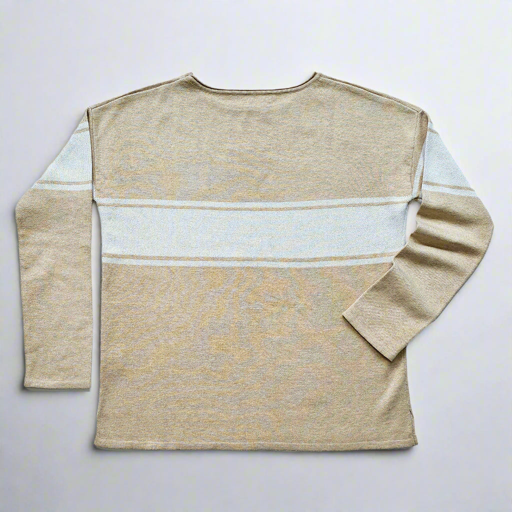The back of the beige, straight hemmed sweater with plain cuffs and rolled neck is displayed against a white background. The two narrow white stripes and wide stipe in the center is continued onto the upper back and upper arms.