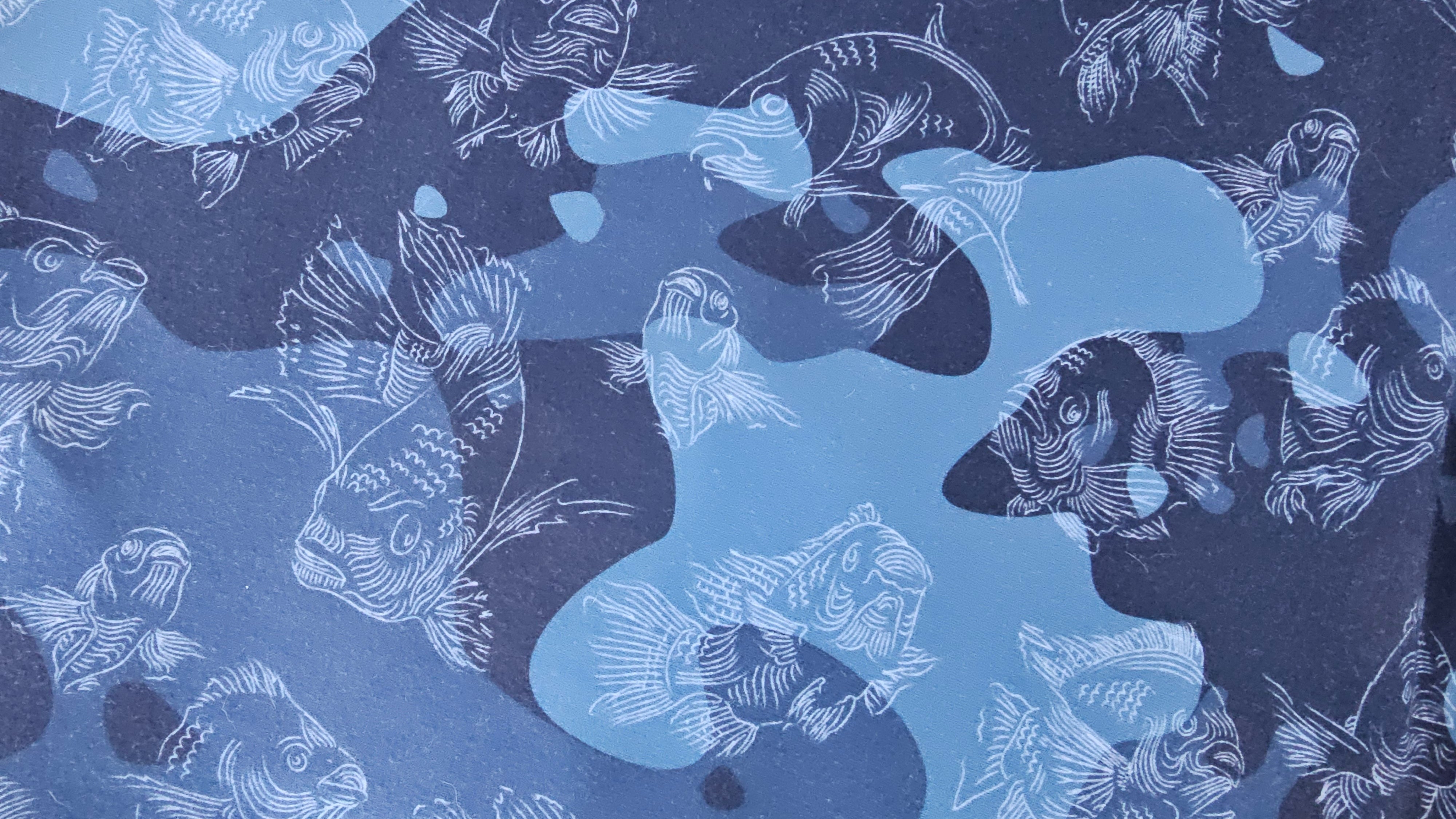 Blue and back camouflage fabric with fish design
