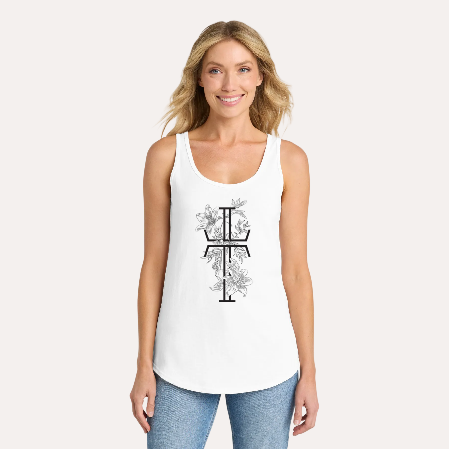 Woman wearing a white tank top with a black cross design on a white background