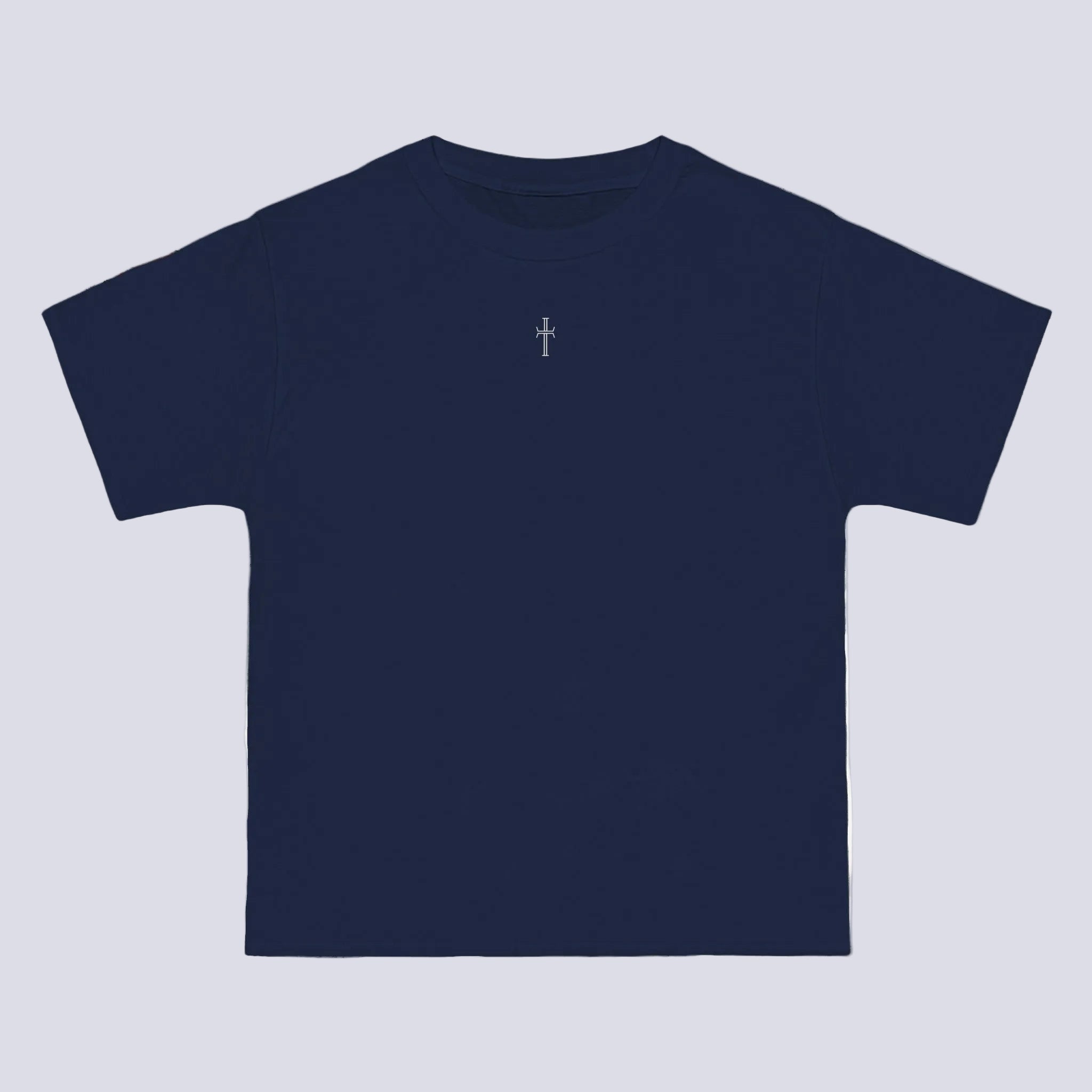A navy crewneck tee shirt displays the front of the garment. A small white cross logo is printed at the top center.