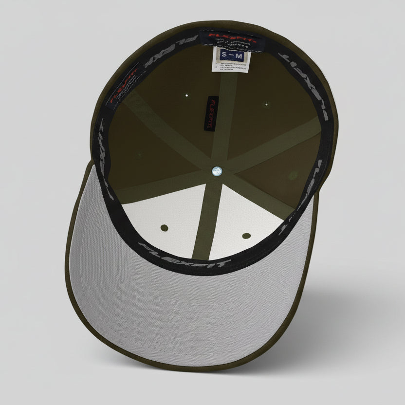 Inside view of olive baseball cap showing 6-panels with taped seams, silver under-brim,and inner elastic band