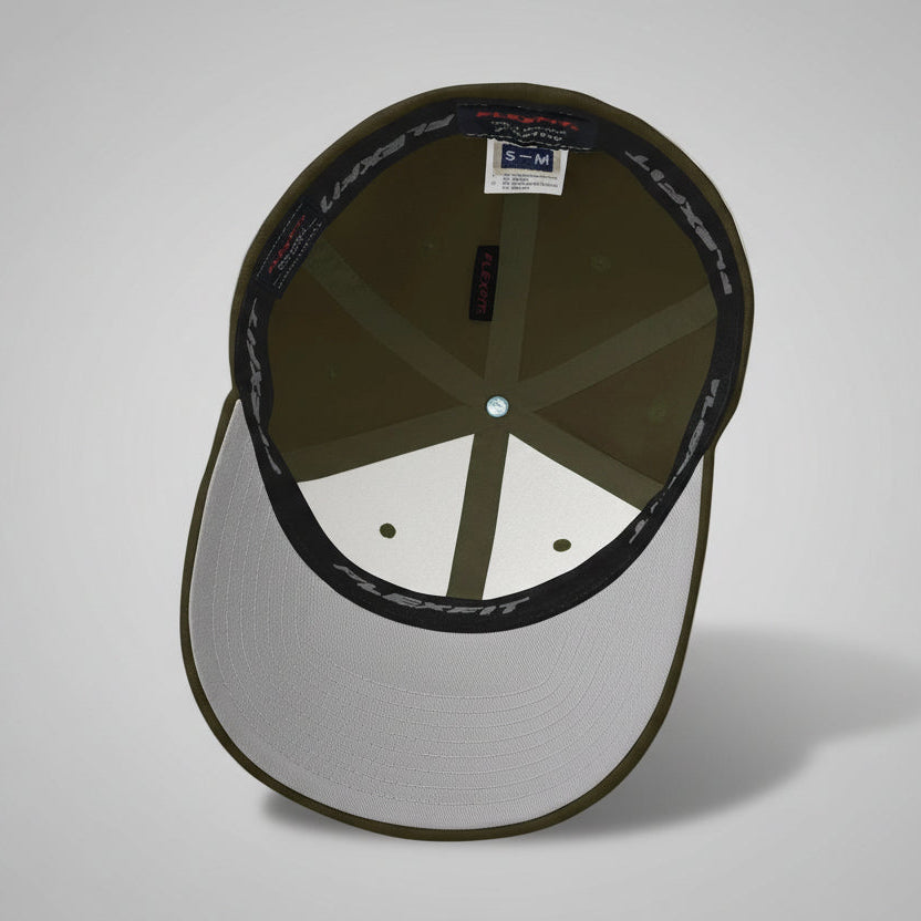 The inside view of an olive green, 6-panel baseball cap showing a silver under-bill, reinforced front panel, taped seams, and elastic inner band around the crown for a snug fit.