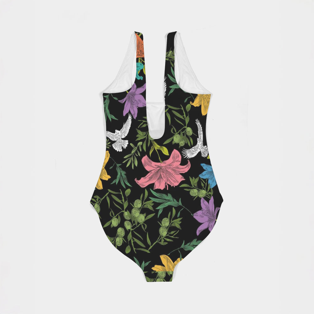 Back of one-piece swimsuit with floral pattern laying flat against a white background