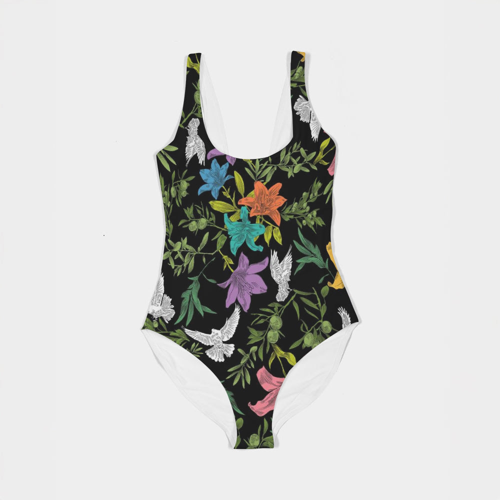 Front of one-piece swimsuit with colorful floral pattern laying flat against a white background