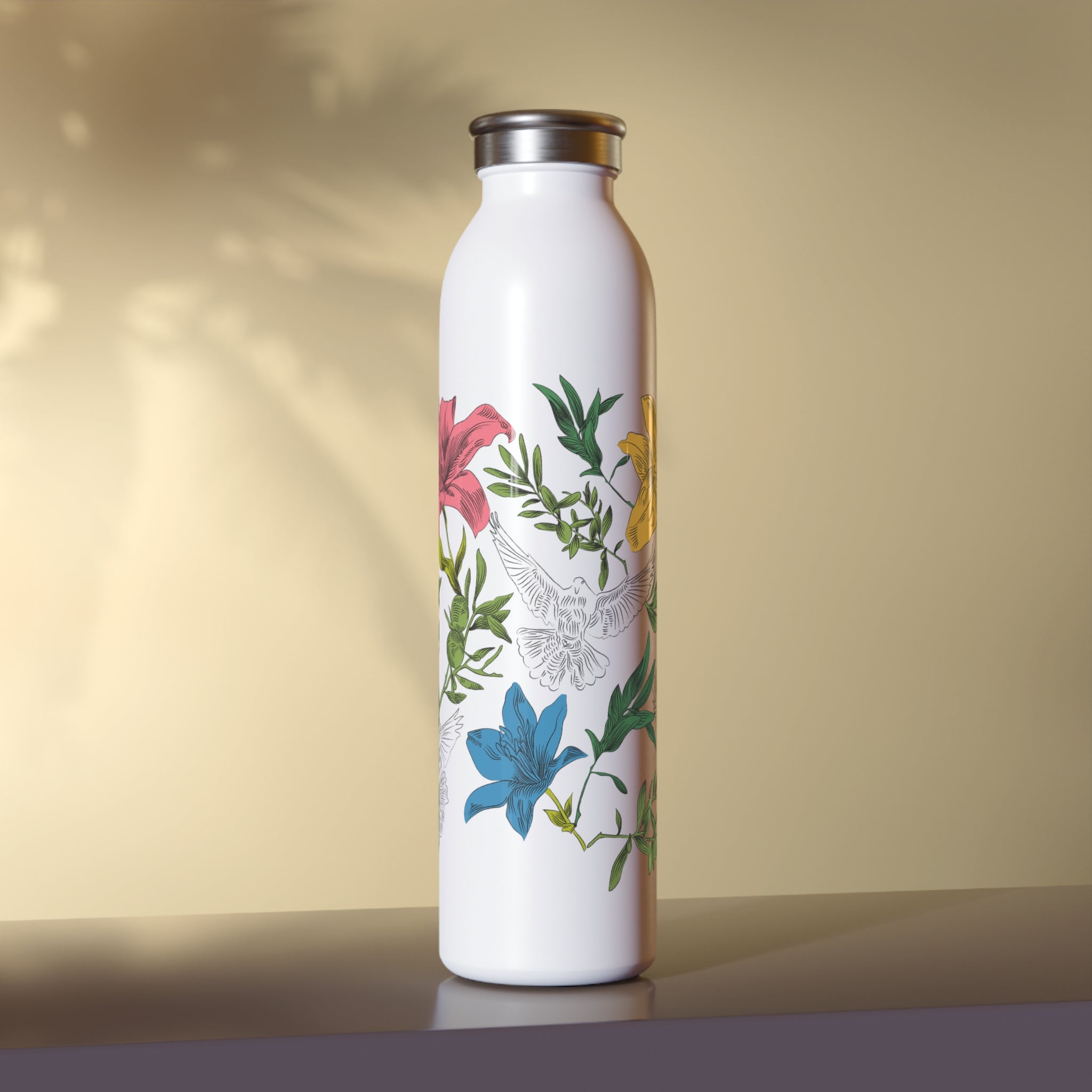 Front side of white water bottle with floral and dove design on a beige background