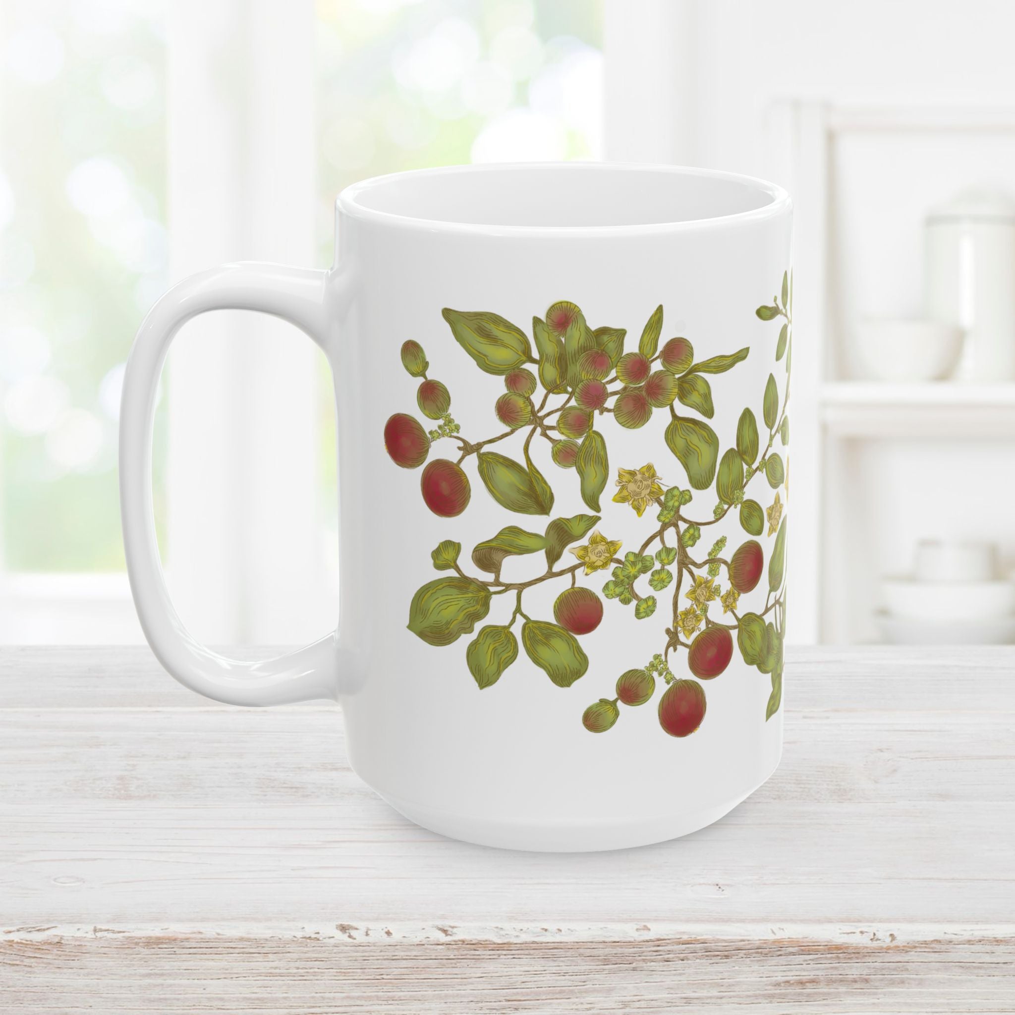 Right side of white mug with floral, berry, and leaf design on a wooden surface.
