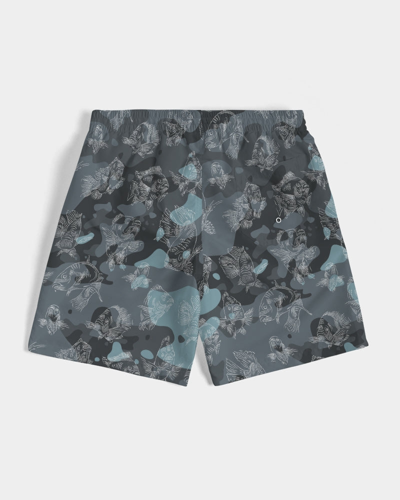 The back view of a pair of blue camo board shorts with an all-over swimming carp print in white, lay flat against a white background.