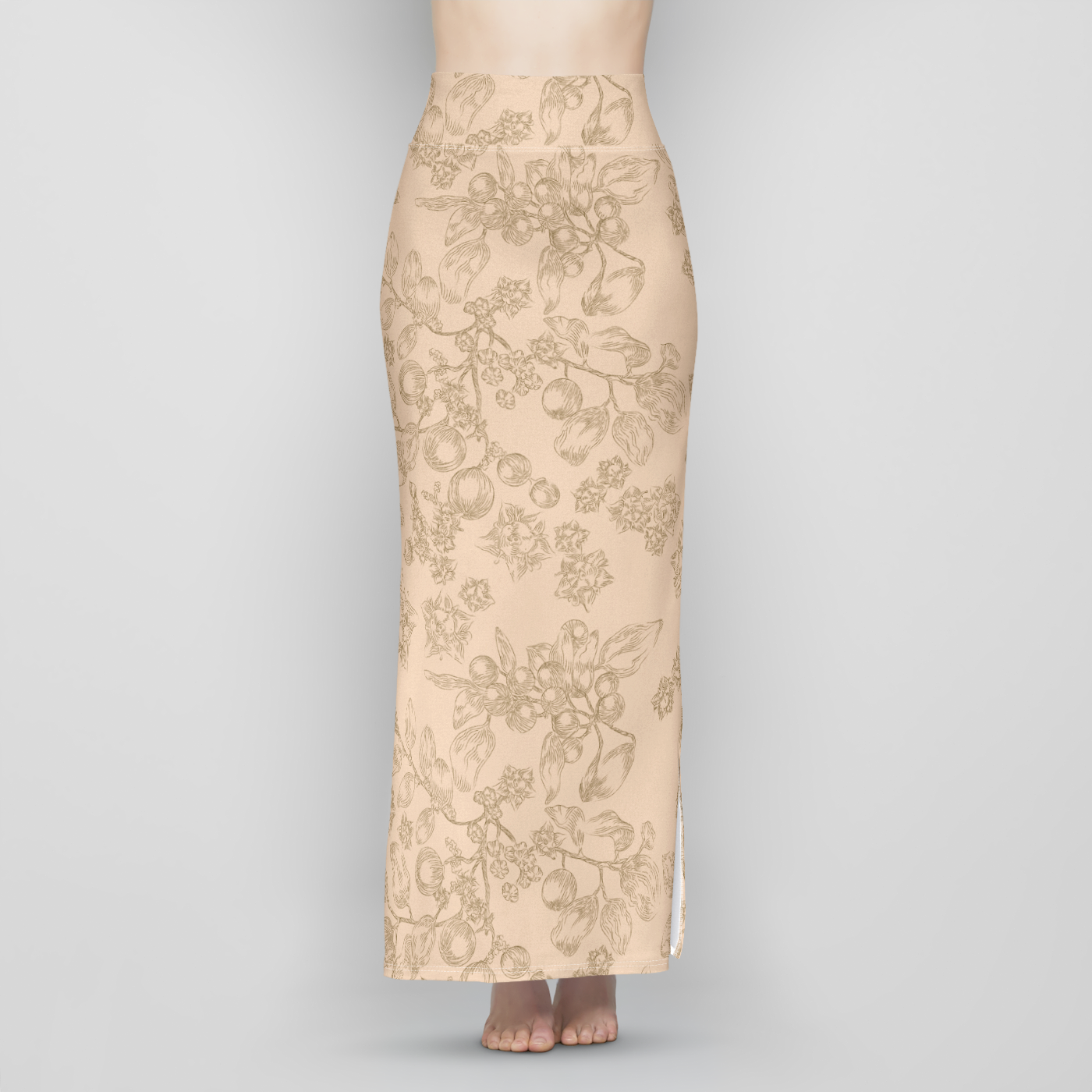 The front lower half of a slender woman wearing a long, beige, sheath-style, maxi skirt with a dark brown line-drawing pattern of a plant with small flowers, berries, and leaves. The skirt is high-waisted with a wide band of patterned fabric at the waist.