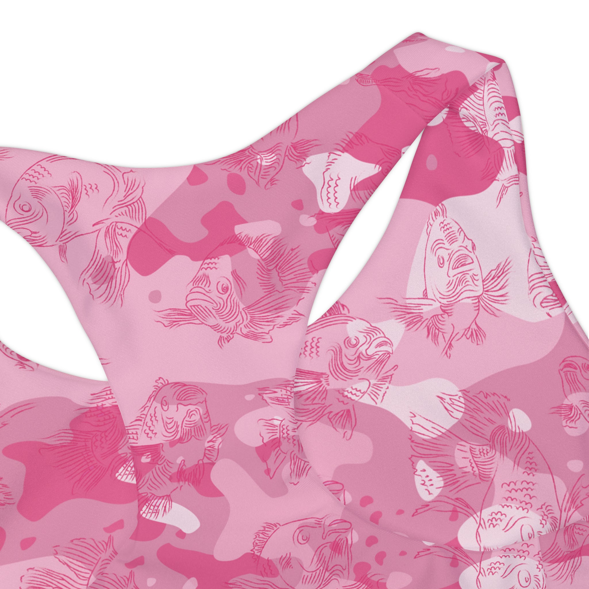 Close-up of tank swim top showing the finer details of the pink-camo design and all-over swimming carp pattern in dark pink.