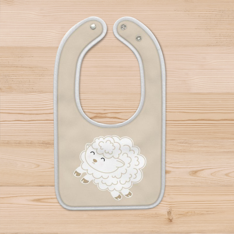 A beige baby bib with a cute white fluffy lamb in mid-leap. The bib has a white rolled border and two plastic snaps for alternate sizing.