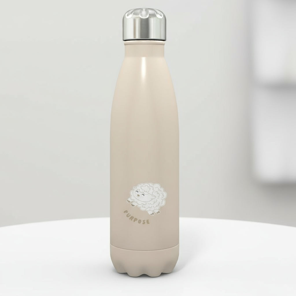 Beige water bottle with a computer illustrated baby lamb image and the word PURPOSE on the front and back, with silver cap, sitting on a table with a white background