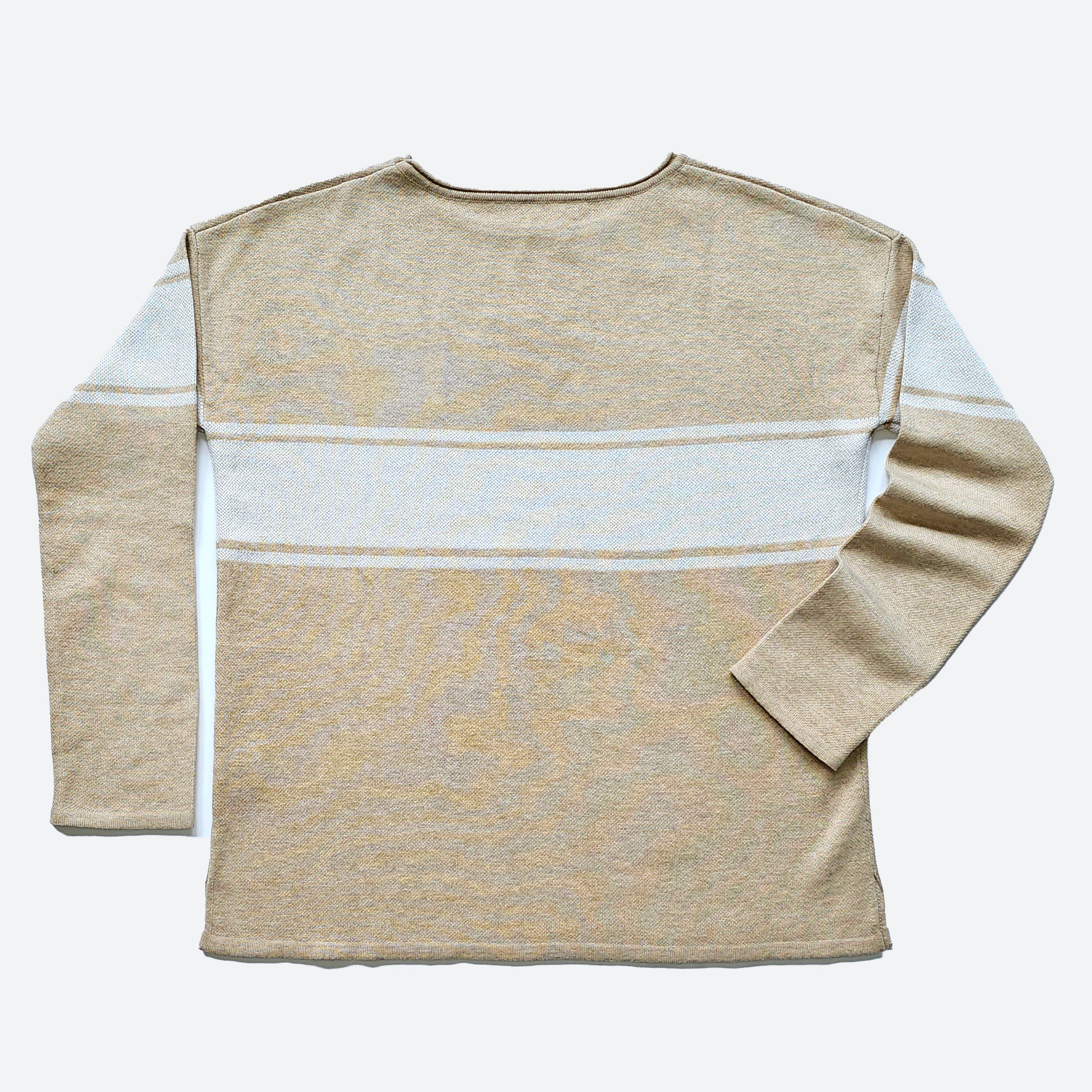 The back of the beige, straight hemmed sweater with plain cuffs and rolled neck is displayed against a white background. The two narrow white stripes and wide stipe in the center is continued onto the upper back and upper arms.