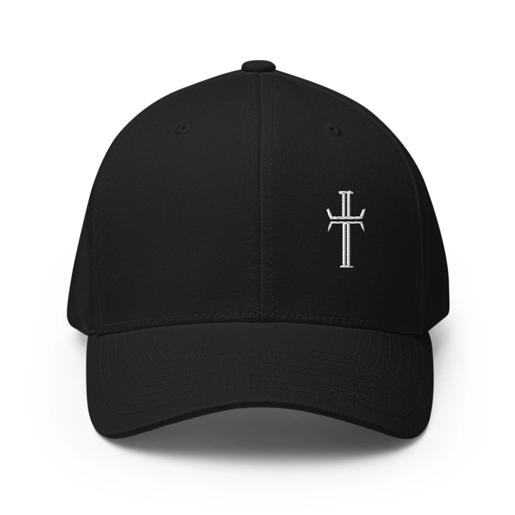 Black cap with a white cross emblem on the center left panel, on a white background