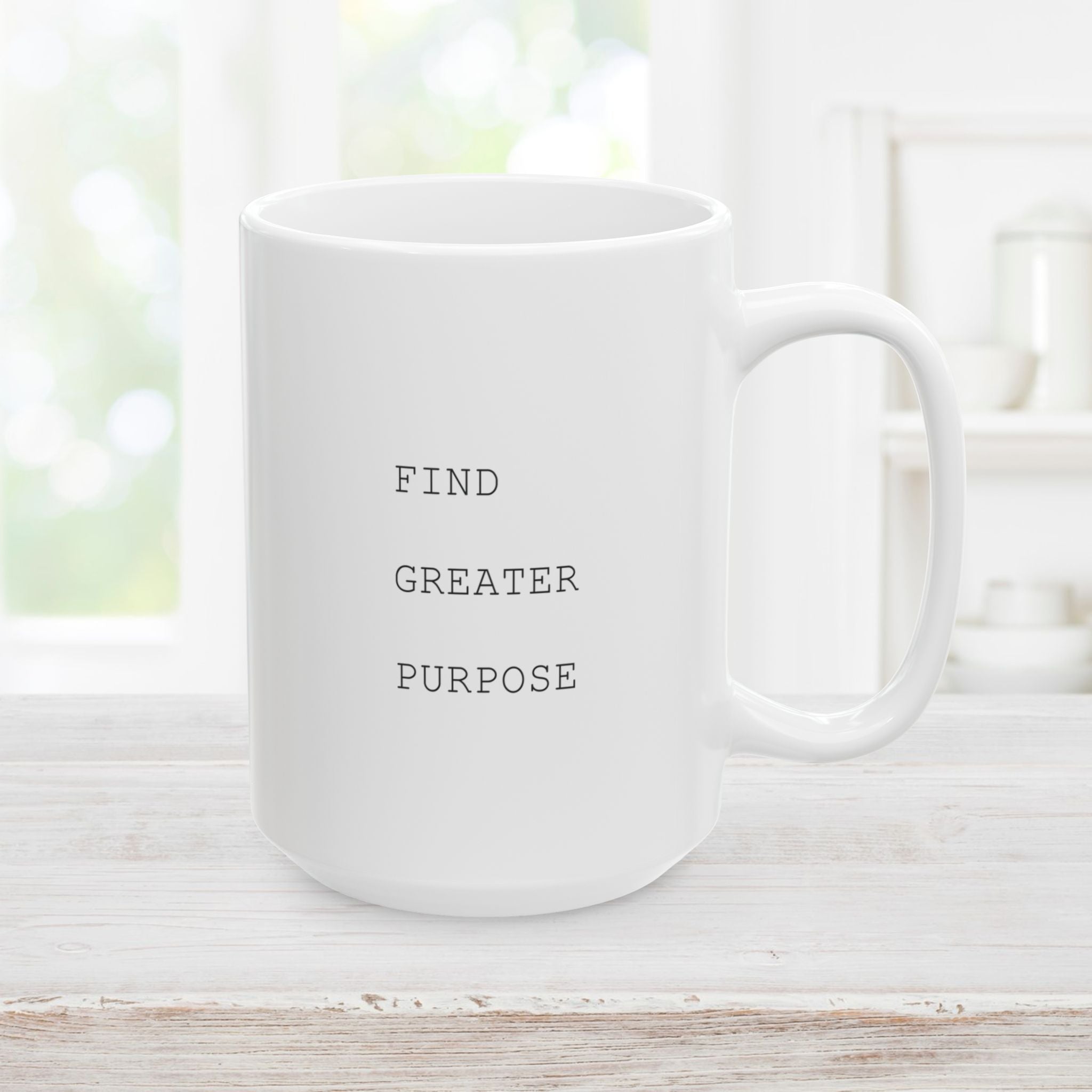 Left side of 15oz white mug with 'FIND GREATER PURPOSE' text on a light wooden surface.