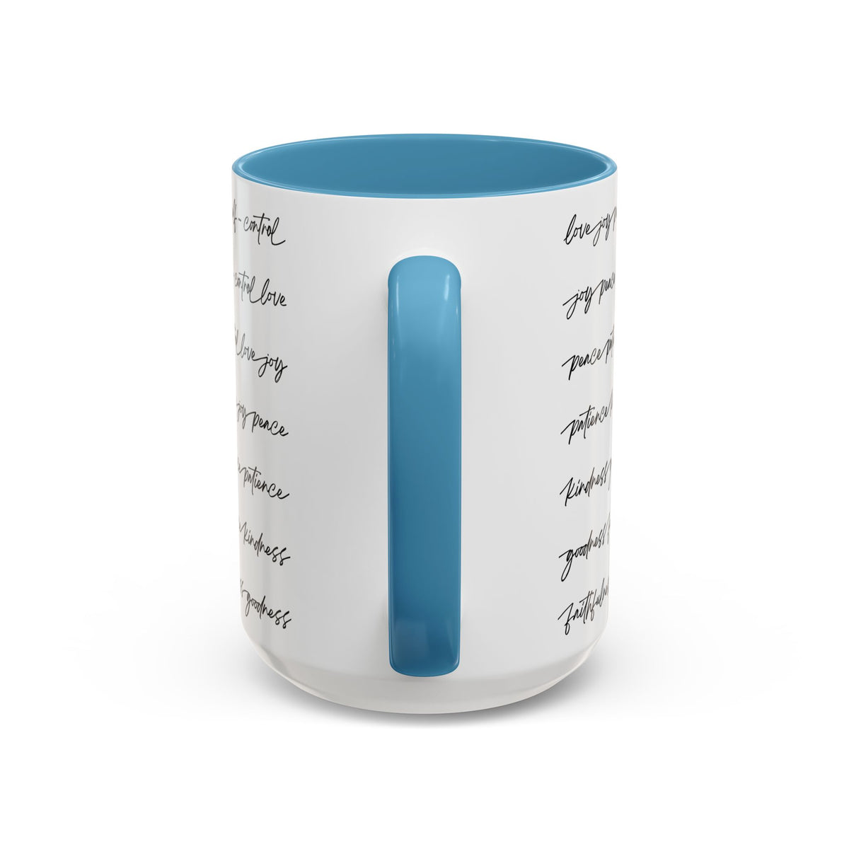Handle side of 15oz mug with light blue interior and handle with black scripted text written on a white background sitting on a wooden surface with coffee beans and a spoon.
