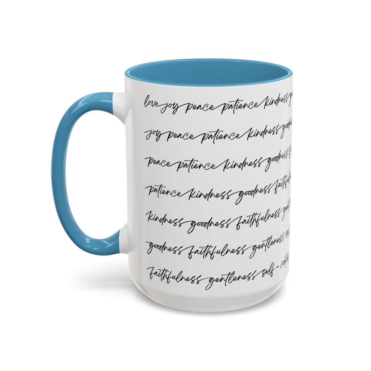 Left side of 15oz a mug with light blue interior and handle with black scripted text written on a white background sitting on a wooden surface with coffee beans and a spoon.
