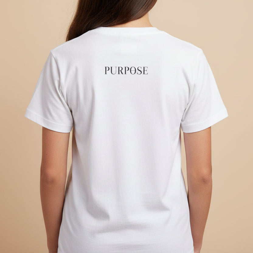 White t-shirt with 'PURPOSE' text on a peach background
