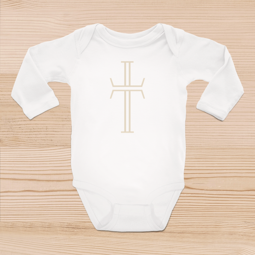 The front view of a white baby onsie with a large, beige, Purpose cross logo on the center front of the garment.