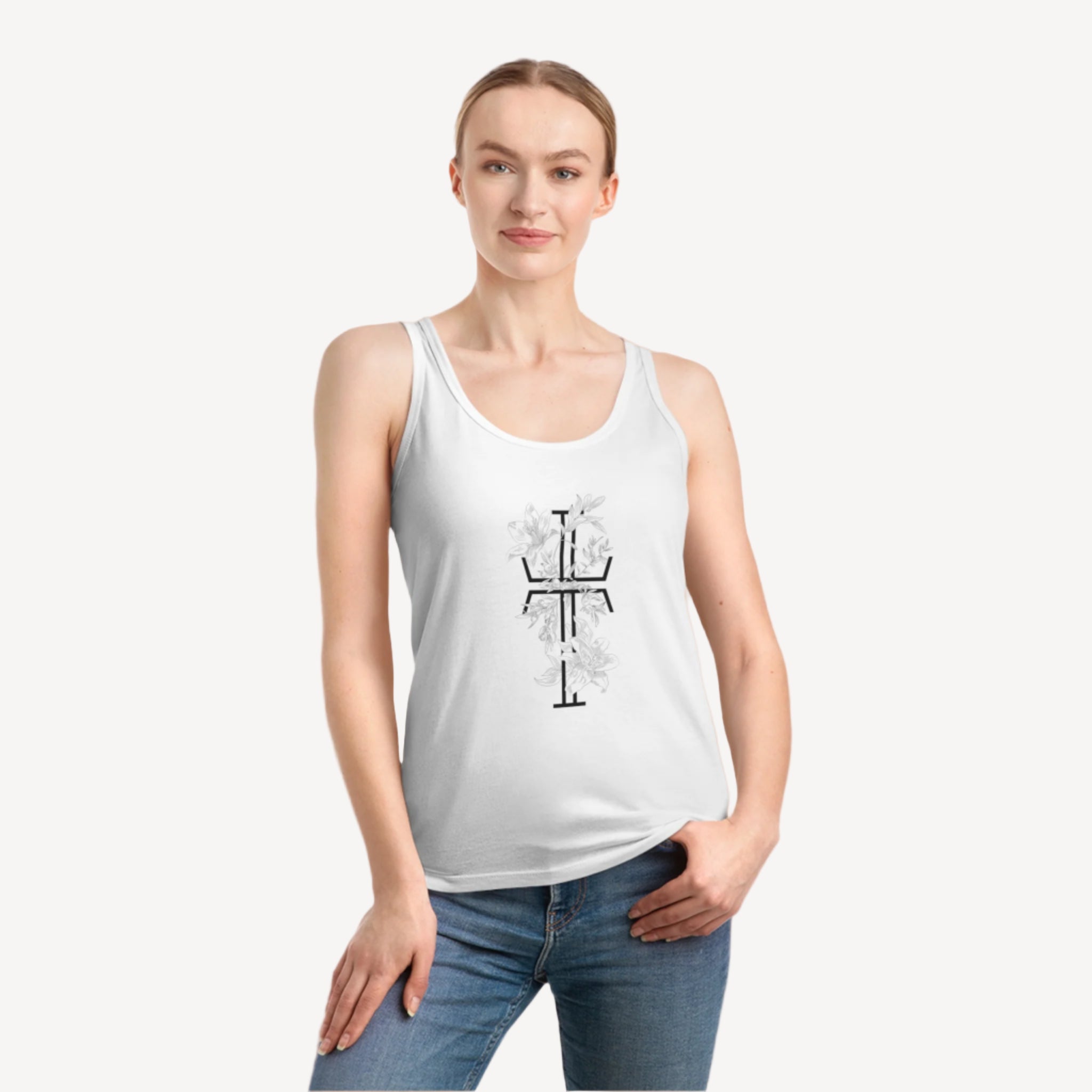 A woman is wearing a white floral tank top with a round neckline, and the top features a geometric cross design in black.
