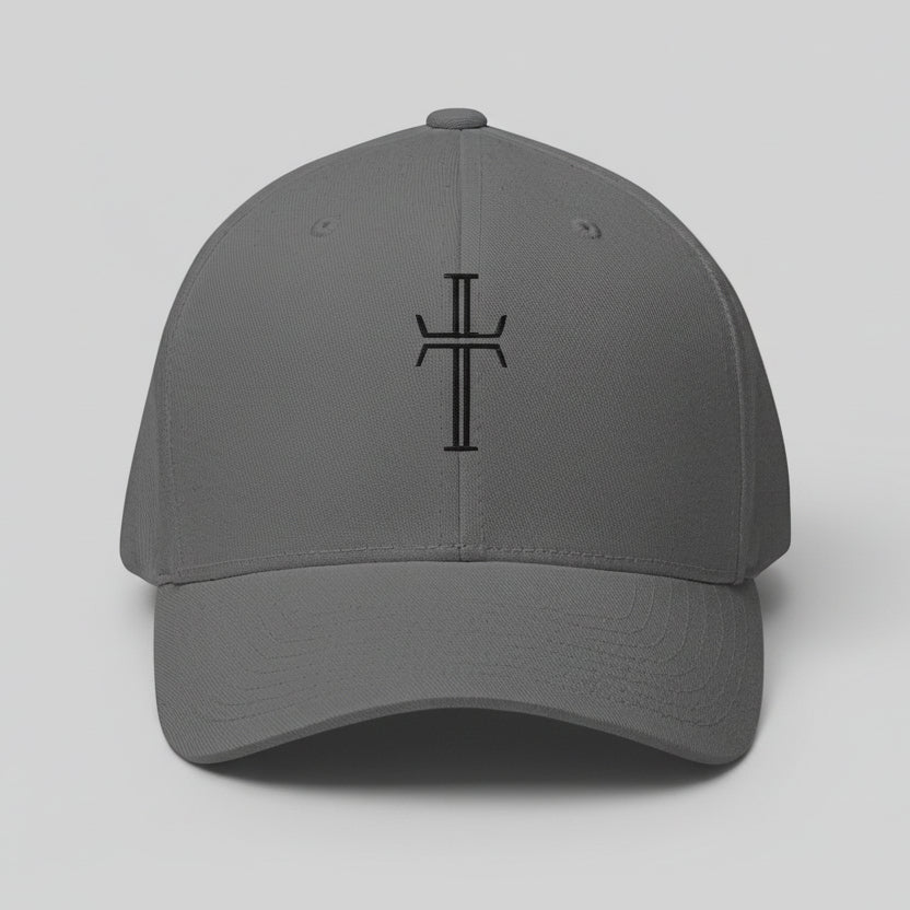 Front view of a light gray-colored, 6-panel baseball cap displaying the Purpose cross logo in black embroidery at the center front.