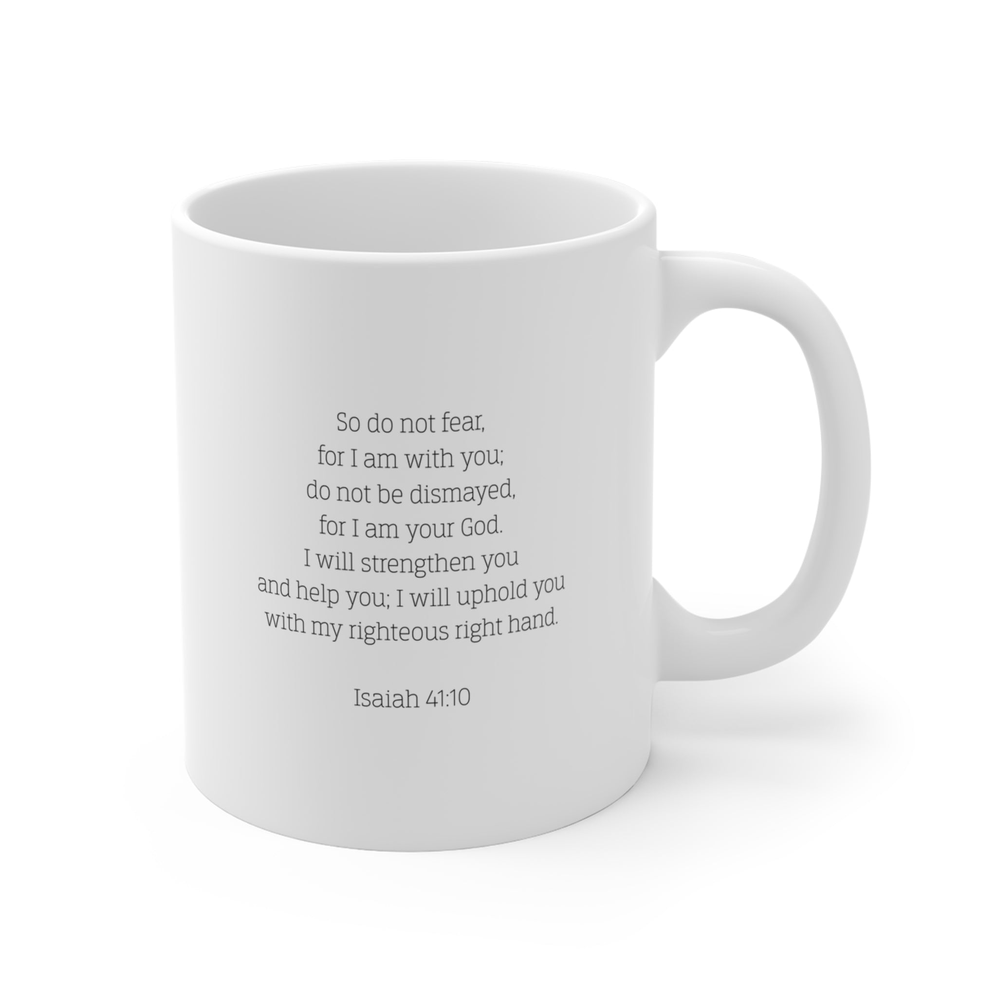 Back of white mug with the Biblical verse Isaiah 41:10 typed on the back against a white background.