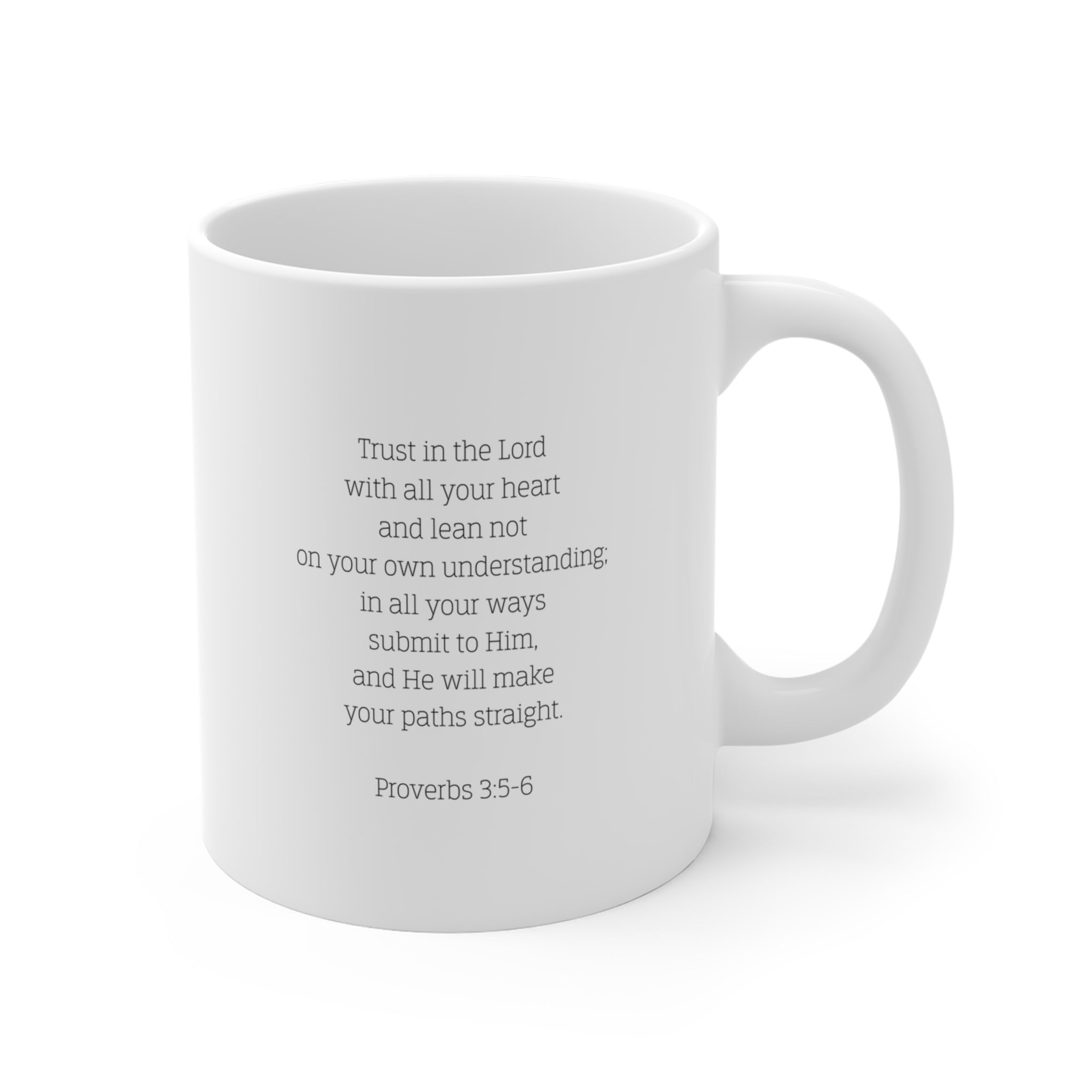 Back of white mug with the Biblical verse Proverbs 3:5-6 typed on the back against a white background.