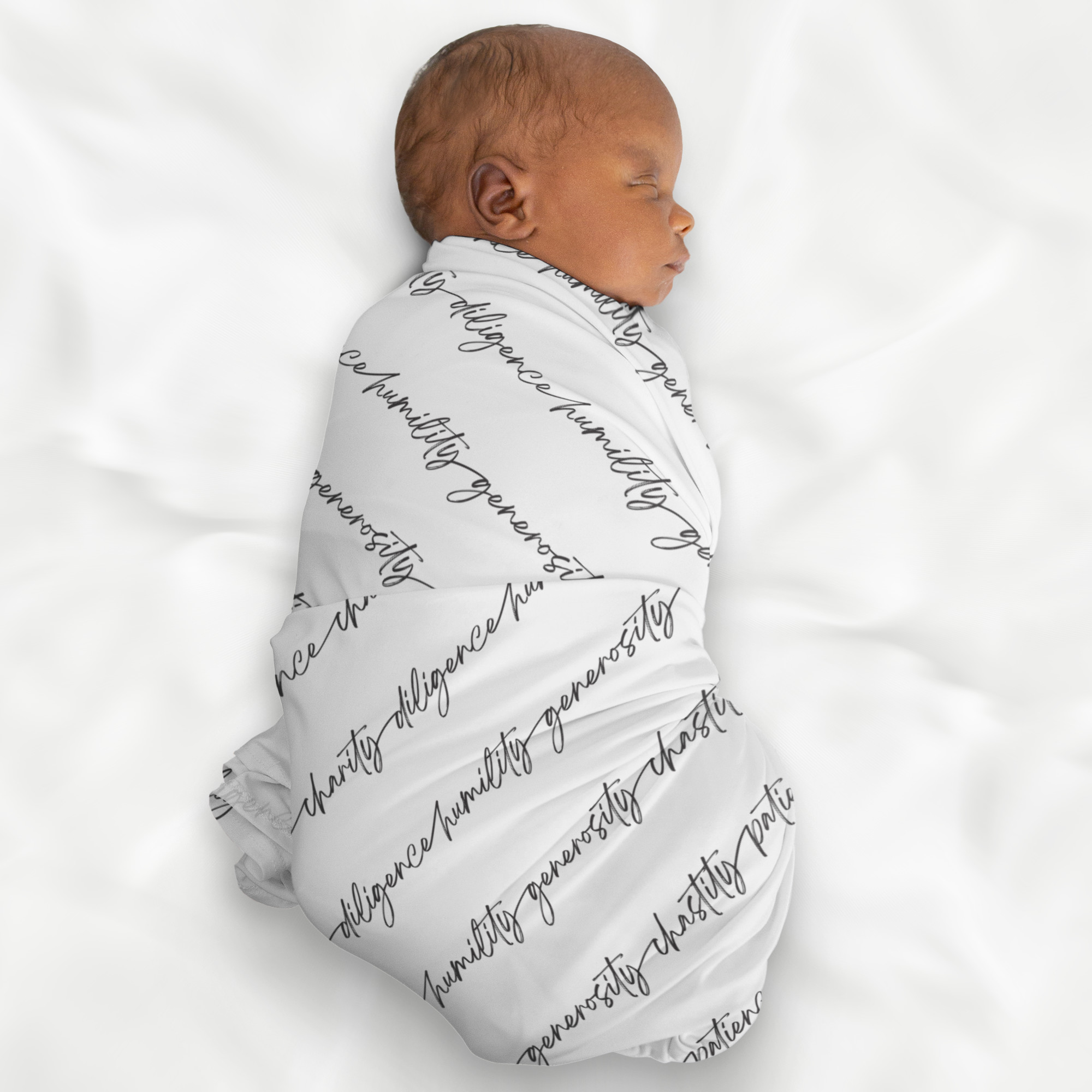 Newborn baby swaddled in a blanket with text on a white background