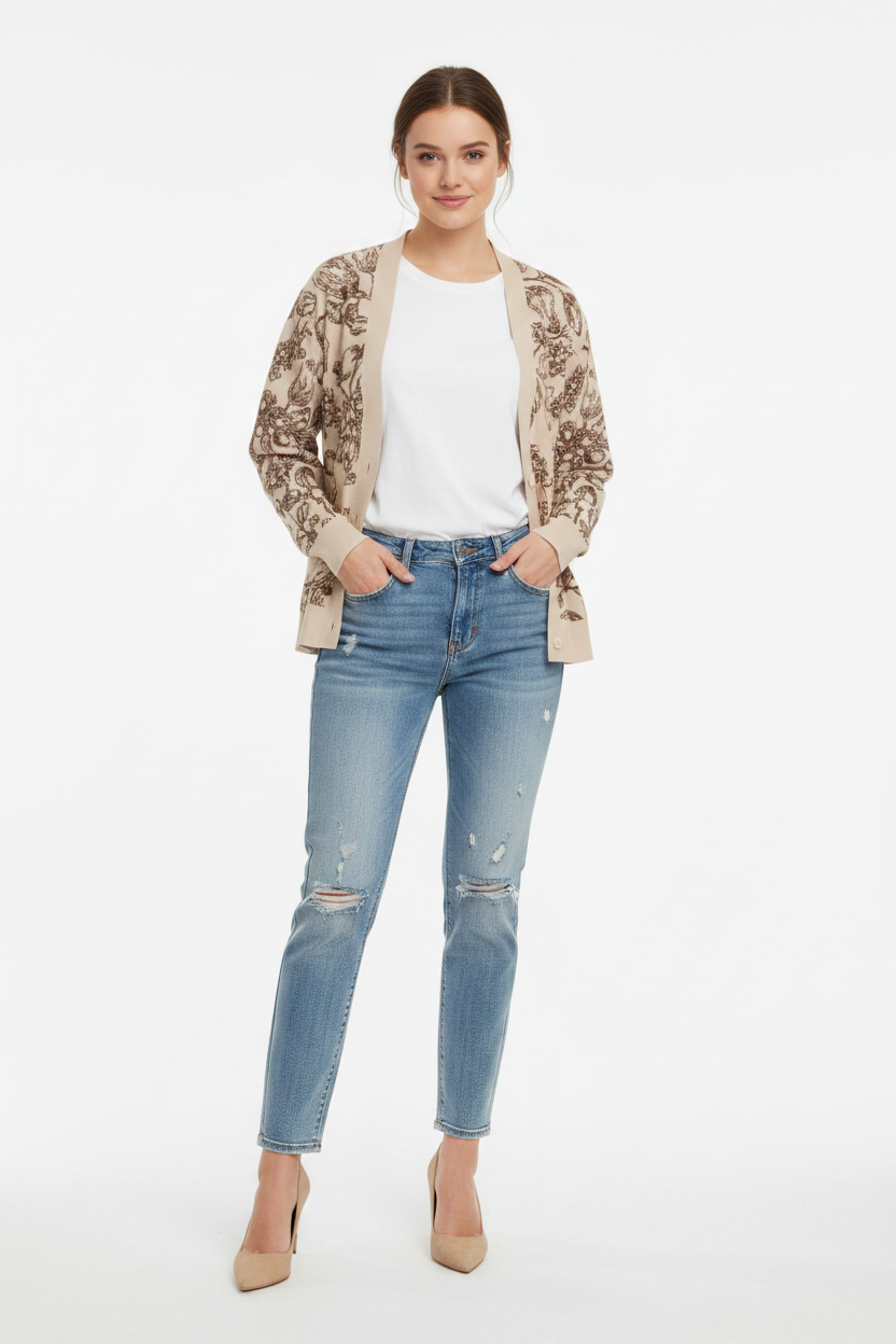 Young woman wearing cardigan with white t-shirt, jeans, and beige pumps. Christian sweater.
